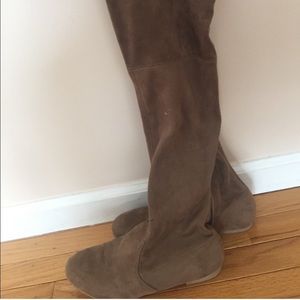 In good condition. Beige suede over the knee boot